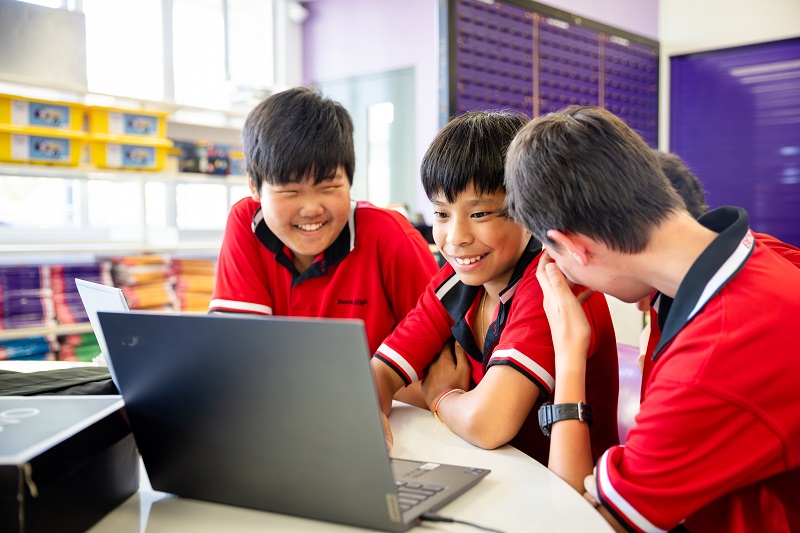 students with laptop